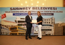 167 kursiyer için sertifika töreni düzenledi.