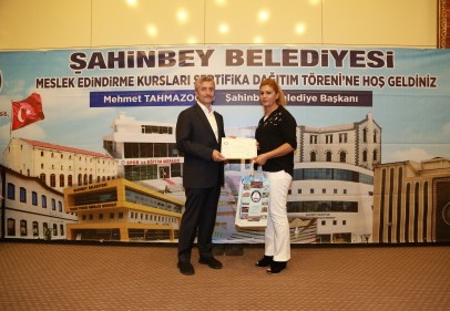 167 kursiyer için sertifika töreni düzenledi.