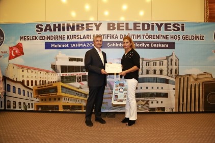 167 kursiyer için sertifika töreni düzenledi.