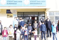 350 çocuğa ayakkabı ve kitap yardımı yapıldı