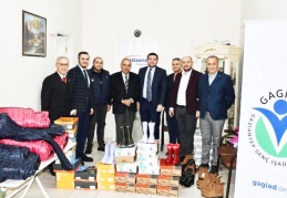 500 öğrenciye mont ve bot dağıtıldı