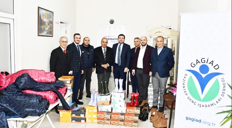 500 öğrenciye mont ve bot dağıtıldı