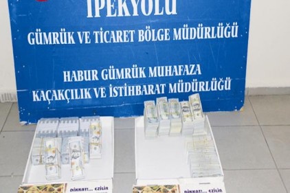 Baklava kutularından dolar çıktı