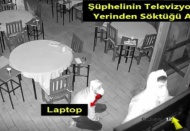 Cerrahi maskeli televizyon hırsızları güvenlik kamerasında
