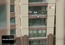 Çin'de 6'ncı kattan düşen çocuk çarşafla kurtarıldı