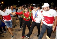 Dünya şampiyonuna havalimanında davullu zurnalı karşılama