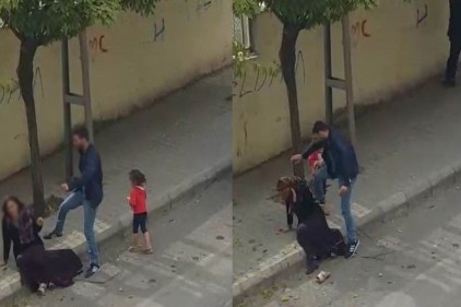 Eşini, çocuğunun gözü önünde sokak ortasında darp etti