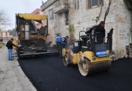 Eski köy olan yeni mahallelerde asfalt çalışmalarını sürdürüyor