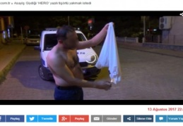 Giydiği ‘HERO’ yazılı tişörtü yakmak istedi