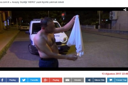 Giydiği &#8216;HERO&#8217; yazılı tişörtü yakmak istedi