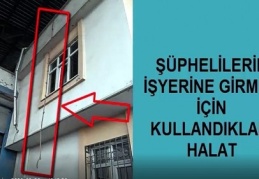 Halatla tırmandıkları iş yerini soydular