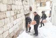 İhtiyaç sahibi ailelerin çocuklarına mont ve bot dağıtıldı