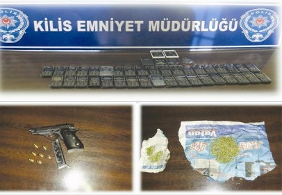 Kaçakçılık operasyonunda silah ve uyuşturucu ele geçirildi