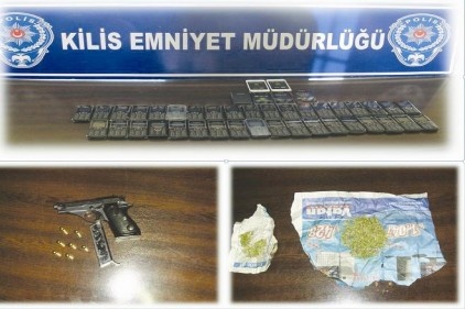 Kaçakçılık operasyonunda silah ve uyuşturucu ele geçirildi