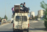 Minibüsün üzerinde yolculuk yapan 4 kişi hakkında yasal işlem yapıldı