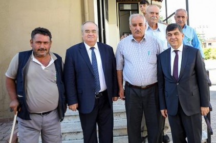 Muhtarlara mahalle bölge haritası armağan edildi