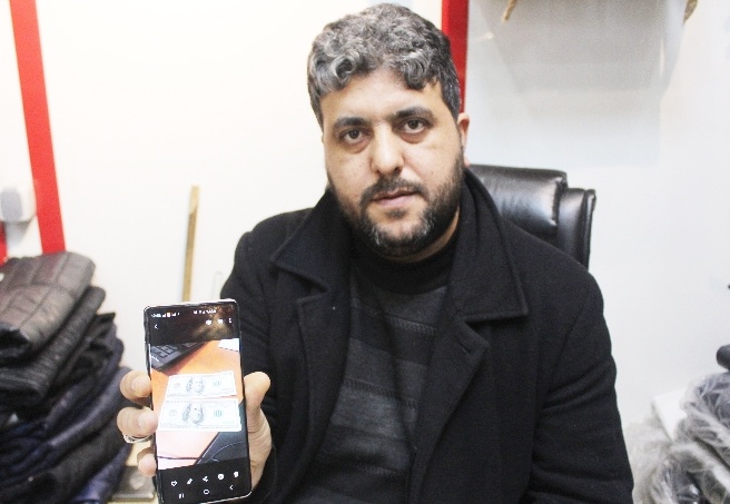 Özel bankadan aldığı dolarlar sahte çıktı