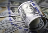 Rusya, dolar rezervini yarı yarıya düşürdü