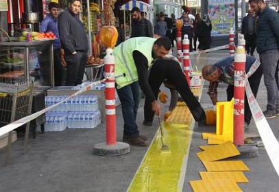 Sarı emniyet çizgileri kaldırımı süsledi