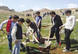Suriyeli öğrenciler hatıra ormanı dikti
