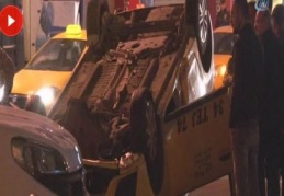 Takla atan taksiden burnu bile kanamadan çıktı!