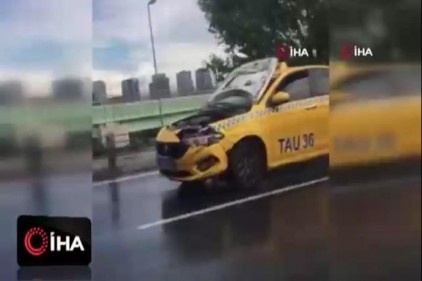 TEM Otoyolu&#039;nda kaputu açık halde seyreden taksi hayrete düşürdü