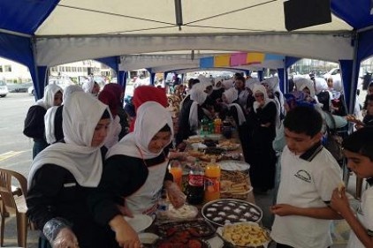 Yetimler yararına kermes düzenledi